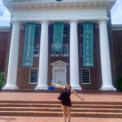 student outside a University building in the US